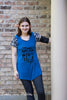 Woman modeling hope tunic length without plackets. Vinyl quote on the blue shirt in black saying "I can sew things."