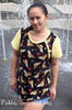 Woman modeling top length of Hope pattern using plackets and wonder woman fabrics.
